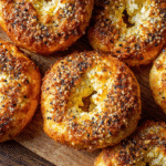 Fluffy cottage cheese almond flour bagels on wooden board