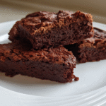 protein brownies stacked on a plate