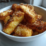 Golden cottage cheese fries on a plate