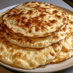 cottage cheese wraps stacked on a plate