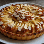 Flourless Apple and Almond Tart – Rustic, Healthy, and Gluten-Free 2 Whole flourless almond tart with apple slices and toasted almonds on top