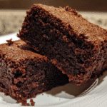 Yogurt Brownies: 9 Easy High-Protein Fudgy Treats 2 yogurt brownies stacked on a plate