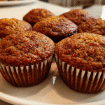 gingerbread muffins cooling on a wire rack